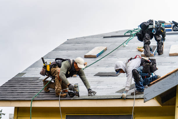 Professional Gutter Installation technician working in Worcester, MA